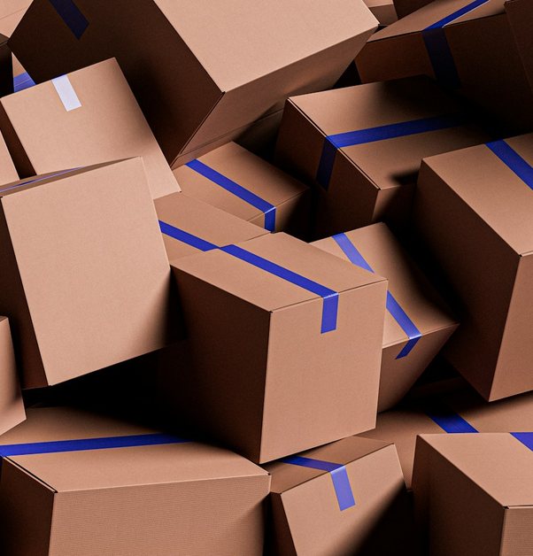 a stack of plain taped cardboard cartons